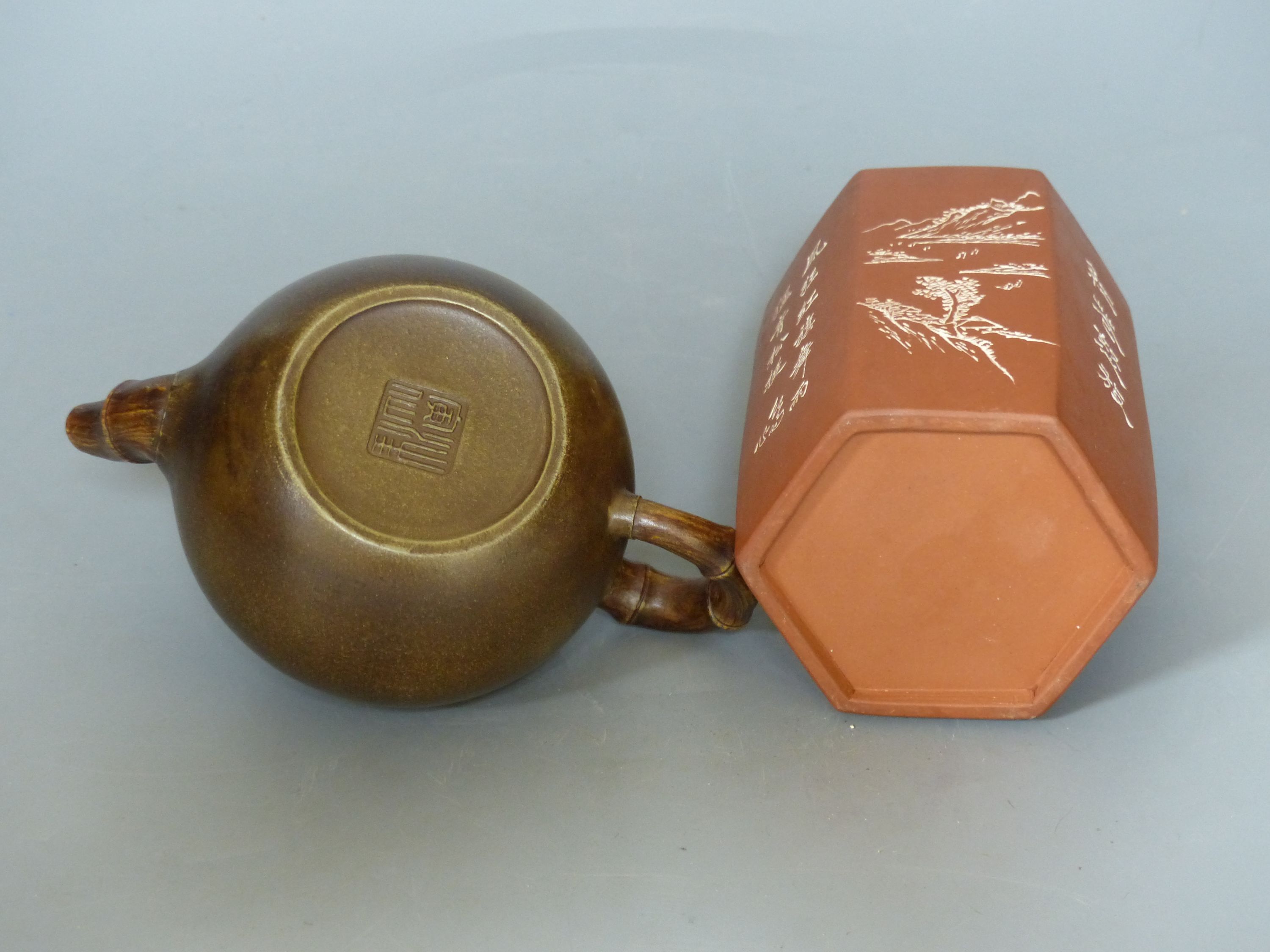 A Chinese Yixing teapot and brush pot with calligraphy and signatures, tallest 12cm